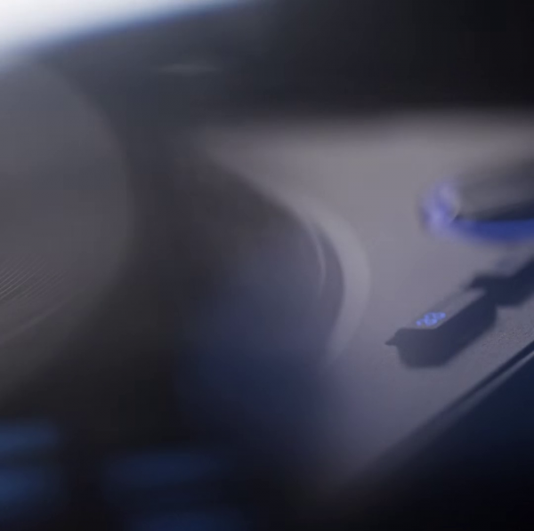 Looking at the first image you'll see a jog wheel and two distinct buttons, one button is lit up and says 33, an obvious reference to LP 33 RPM records.