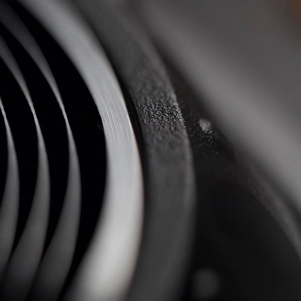 The 4th image is a macro image showing dimples and vinyl grooves.